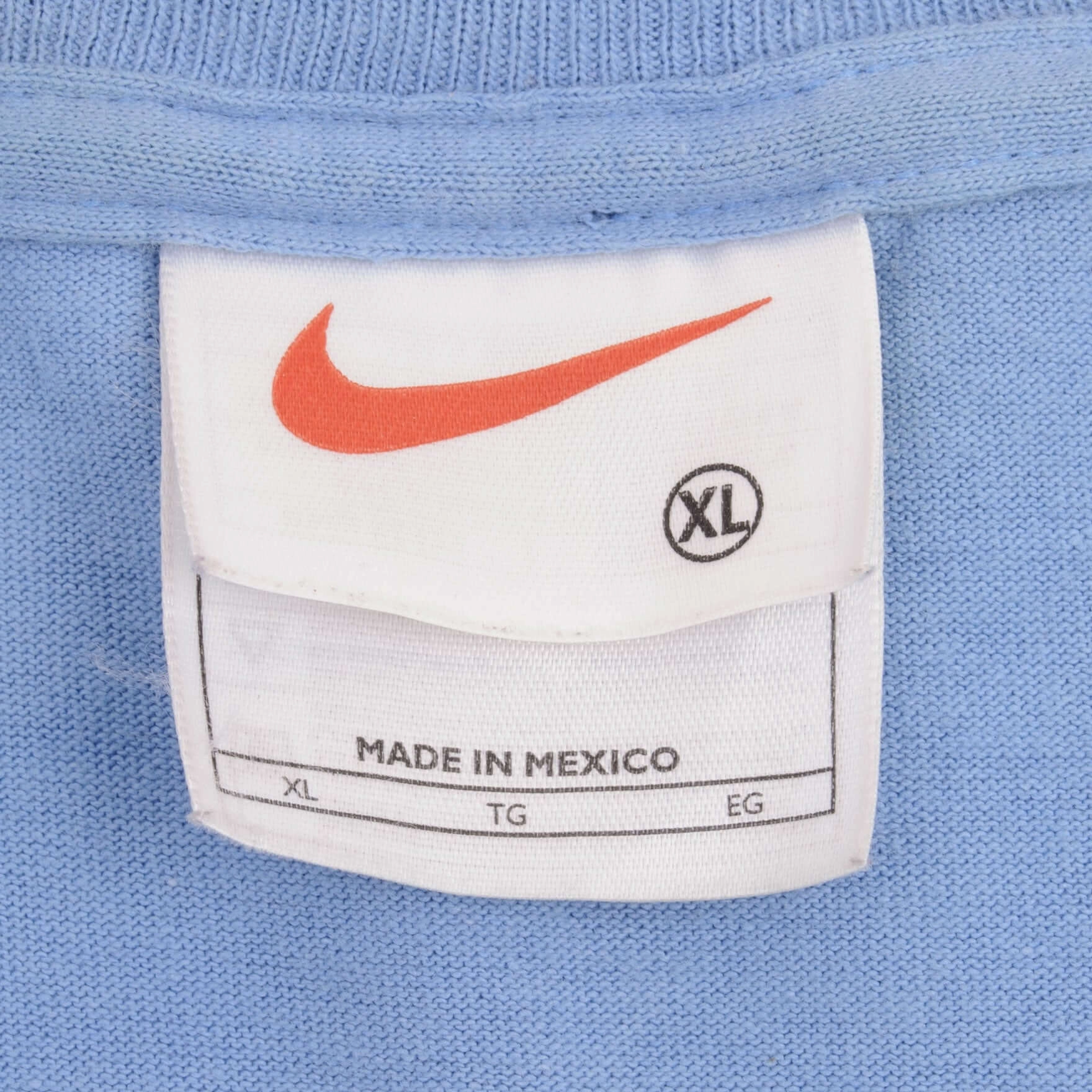 VINTAGE NIKE SWOOSH SPELLOUT LIGHT BLUE TEE SHIRT 1990S SIZE XL